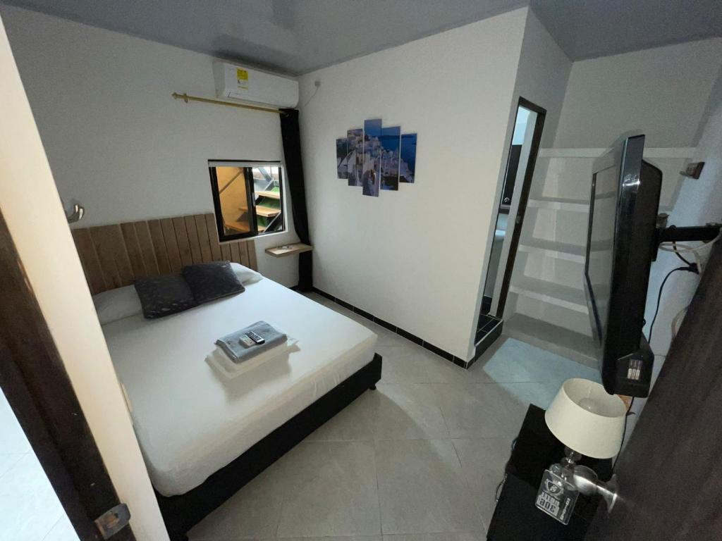 Postel nebo postele na pokoji v ubytování Hotel SG