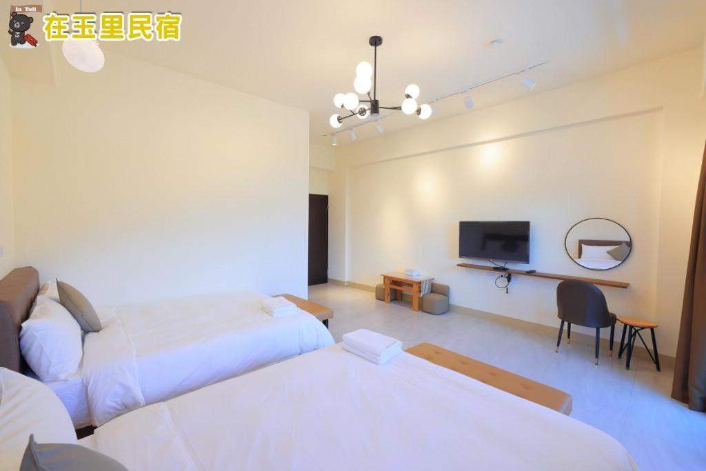 Postel nebo postele na pokoji v ubytování InYuLi Homestay花蓮縣民宿2825號