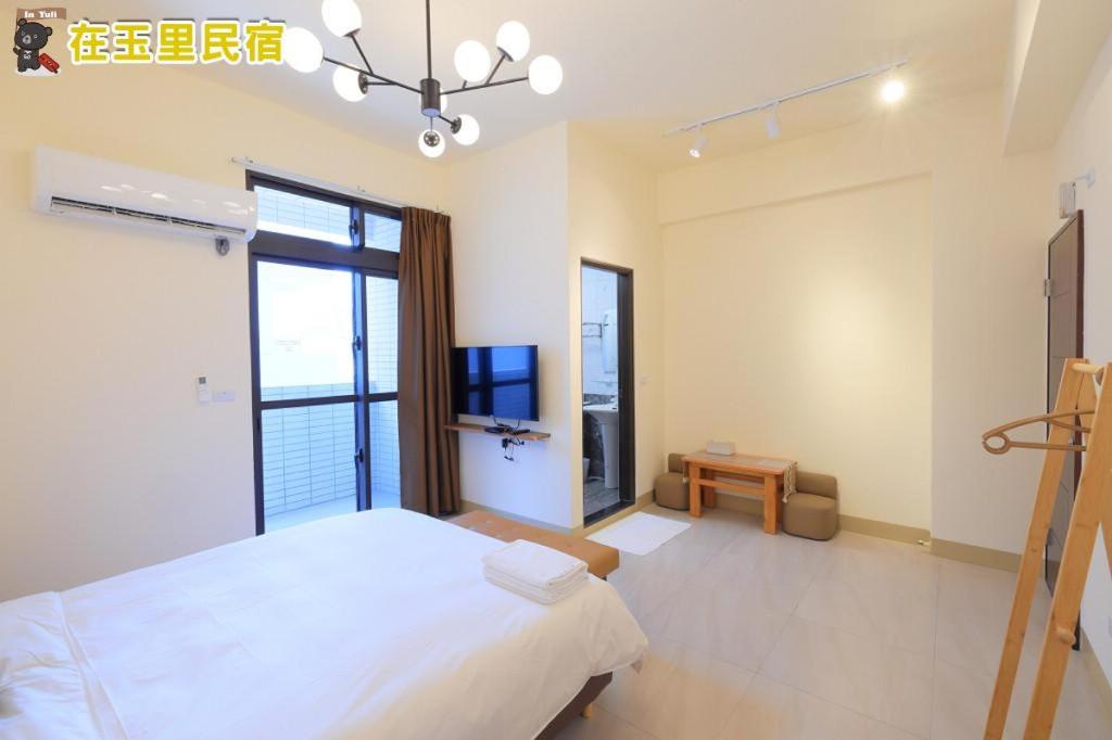 Postel nebo postele na pokoji v ubytování InYuLi Homestay花蓮縣民宿2825號