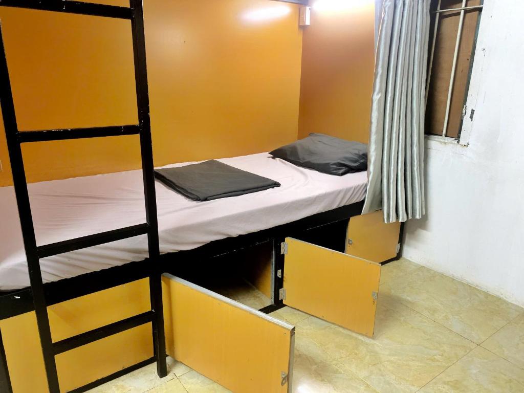 Postel nebo postele na pokoji v ubytování Hanoi New Comb Hostel