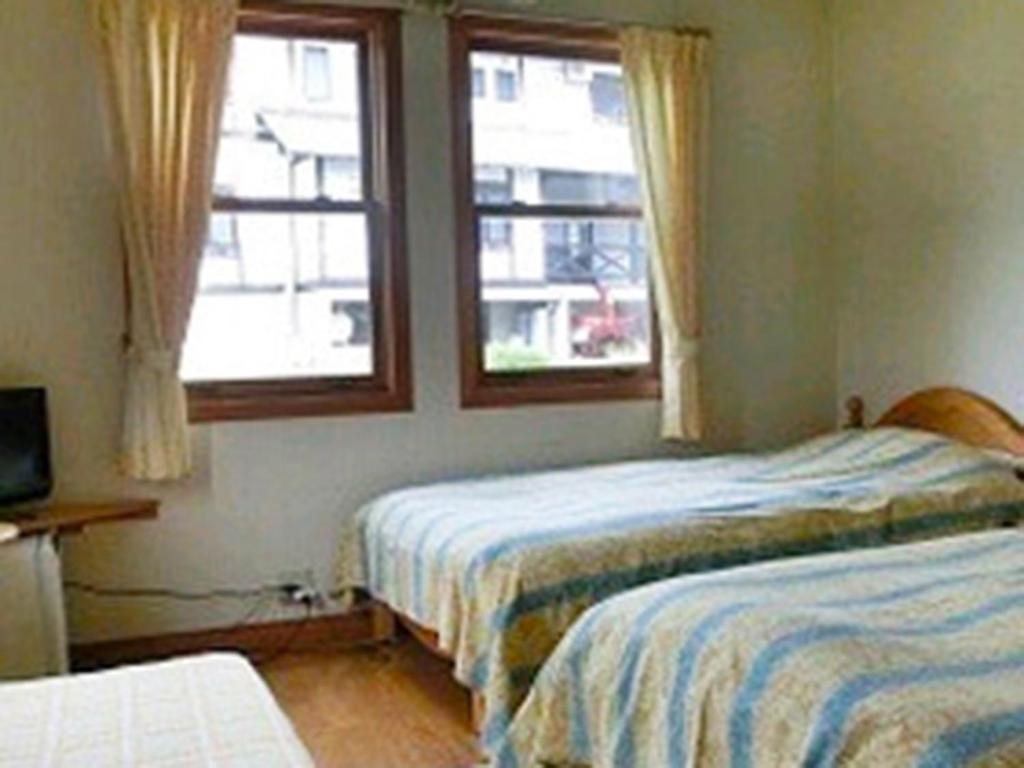 Postel nebo postele na pokoji v ubytování Pension Come
