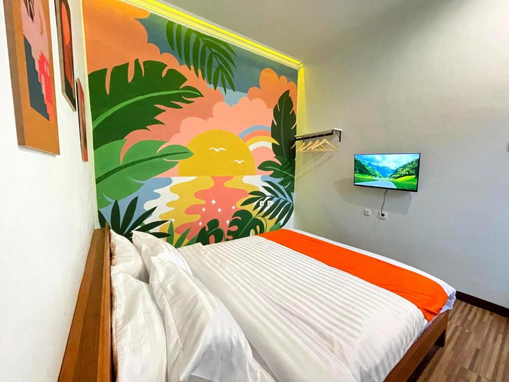 Postel nebo postele na pokoji v ubytování ROOM Ijen Hostel