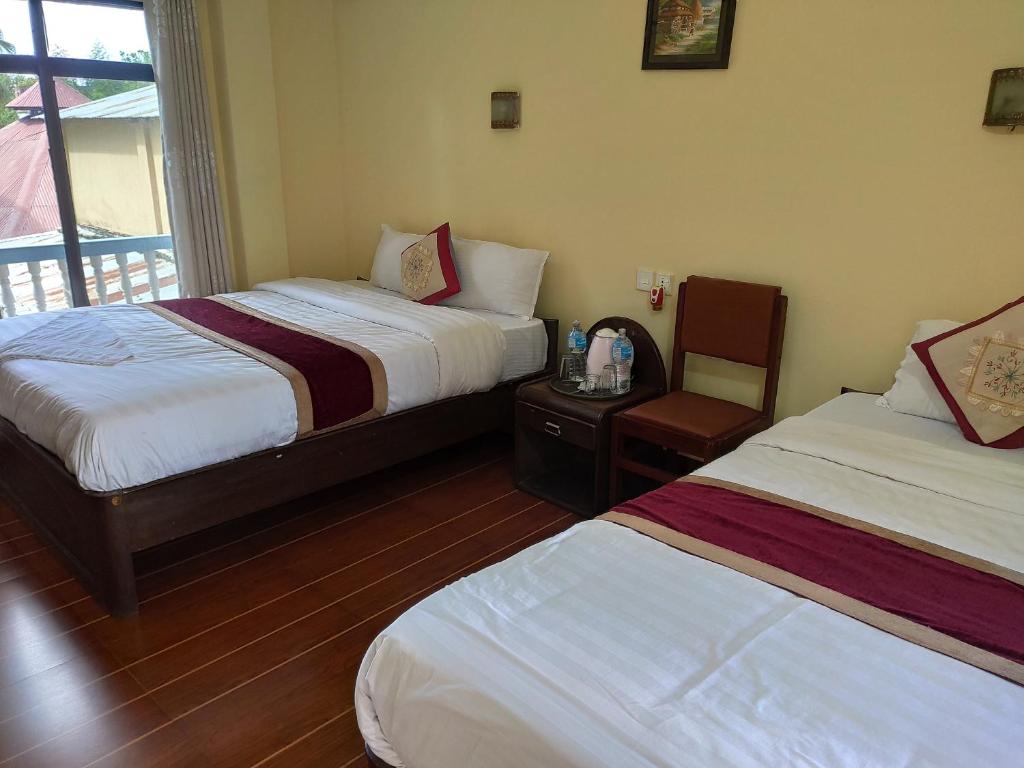 Postel nebo postele na pokoji v ubytování Peacock - a family-run hotel