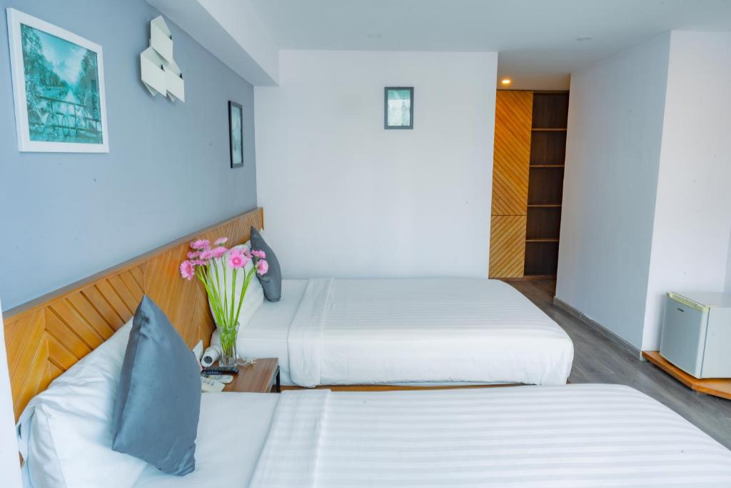 Phòng Giường Đôi/2 Giường Đơn Nhìn Ra Góc Biển