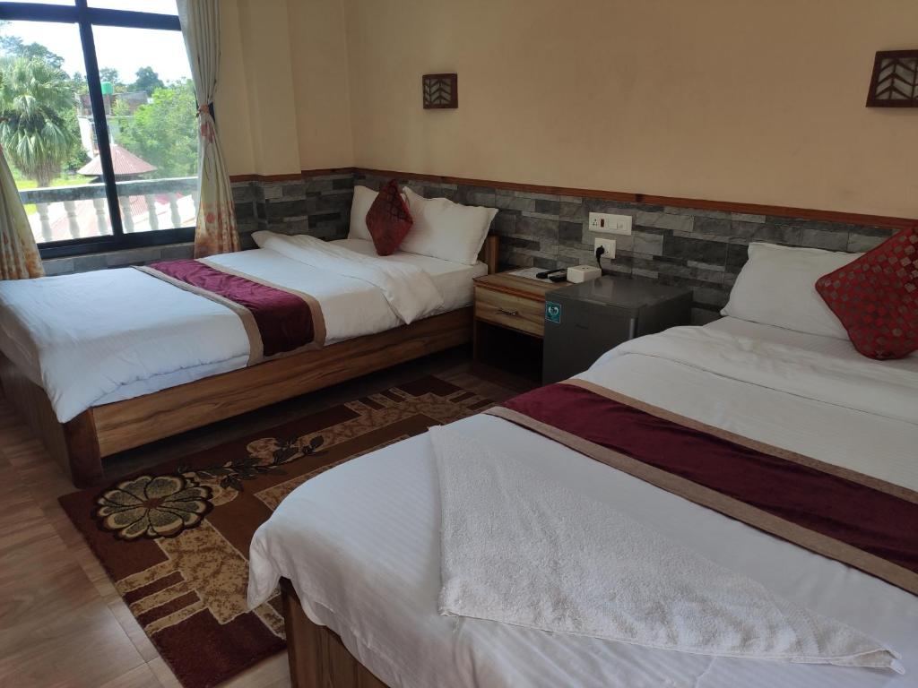 Postel nebo postele na pokoji v ubytování Peacock - a family-run hotel