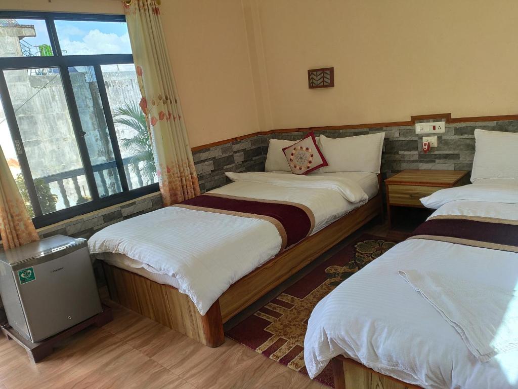 Postel nebo postele na pokoji v ubytování Peacock - a family-run hotel