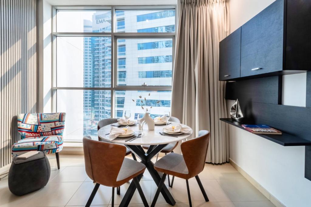 TV a/nebo společenská místnost v ubytování JBR Beach & Marina Walk I Ain Dubai view I 1 BDR