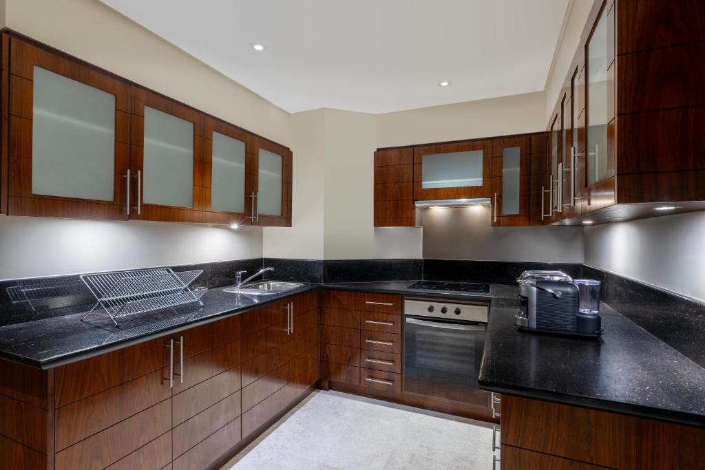 Grand Millennium Al Wahda Hotel and Executive Apartments Abu Dhabi - Resim 43