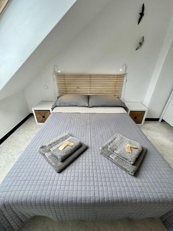 A bed or beds in a room at Entre Montaña y Río Unquera