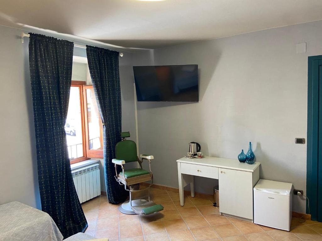TV a/nebo společenská místnost v ubytování B&B Popoli Terme