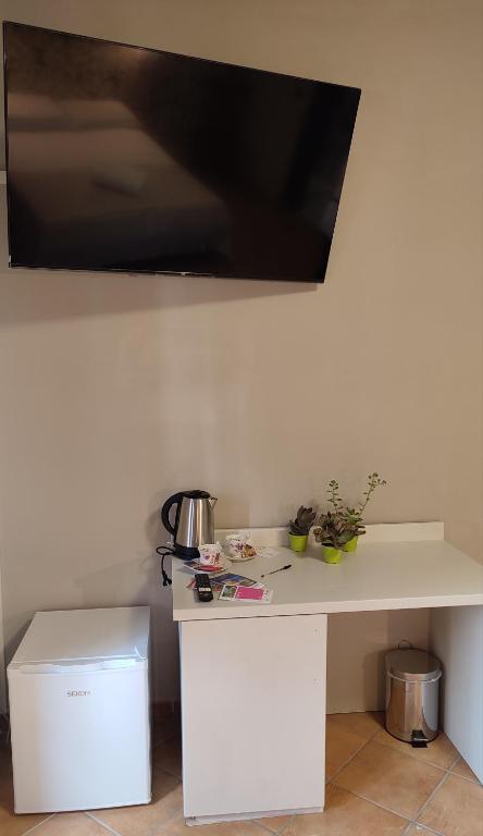 Příslušenství pro přípravu čaje a kávy v ubytování B&B Popoli Terme