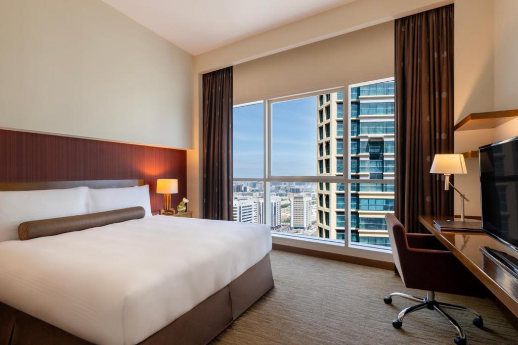 Grand Millennium Al Wahda Hotel and Executive Apartments Abu Dhabi - Resim 19