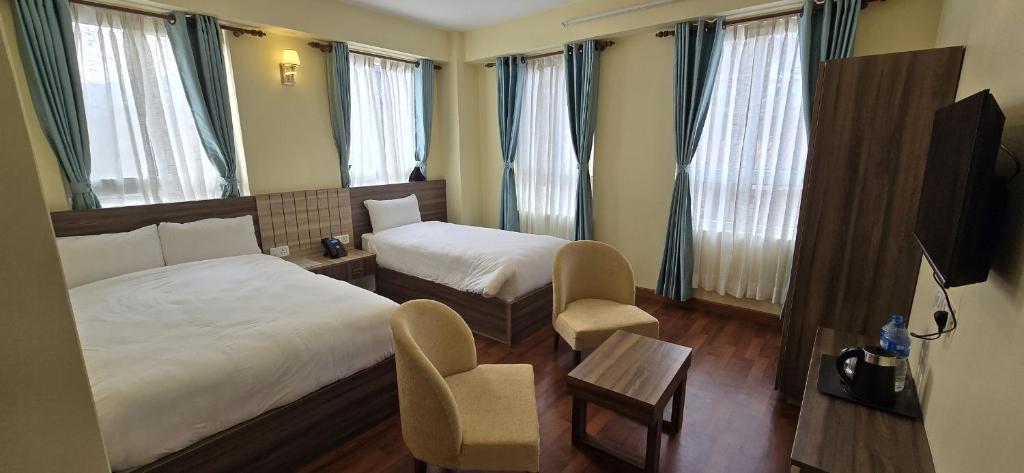 TV a/nebo společenská místnost v ubytování Hotel Dolkha Durbar