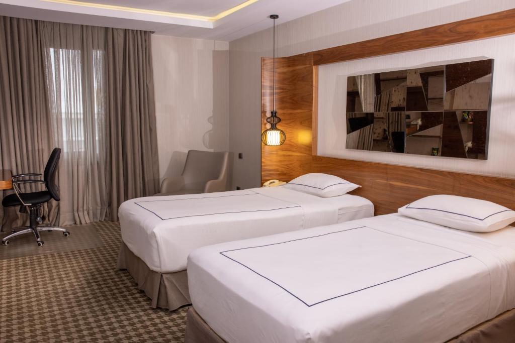 Postel nebo postele na pokoji v ubytování Anemon Kent Ankara Otel
