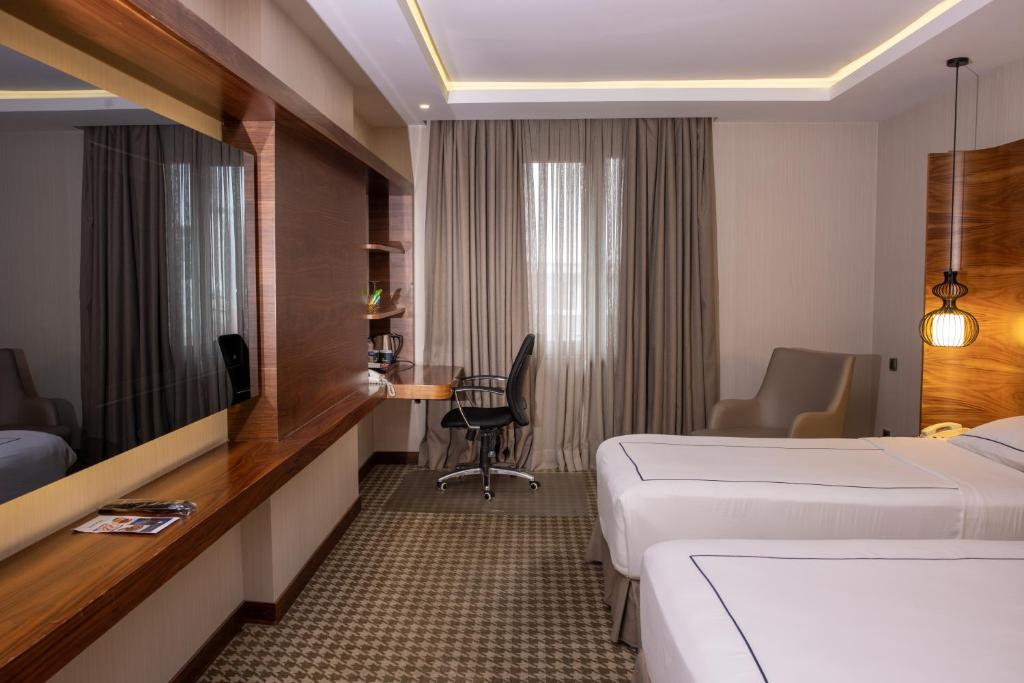 Postel nebo postele na pokoji v ubytování Anemon Kent Ankara Otel
