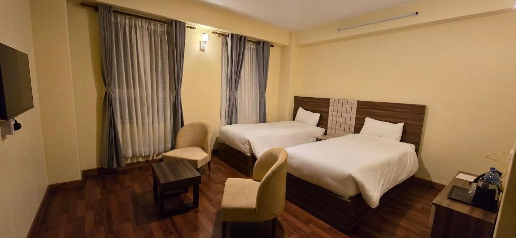 TV a/nebo společenská místnost v ubytování Hotel Dolkha Durbar