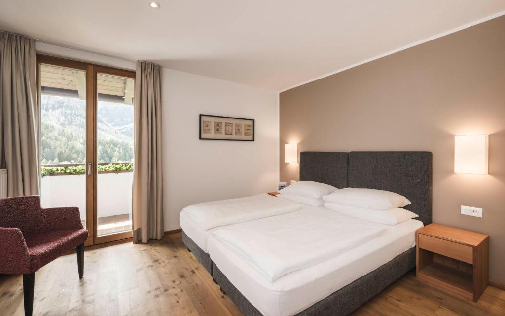 Postel nebo postele na pokoji v ubytování B&B Villa Angelino