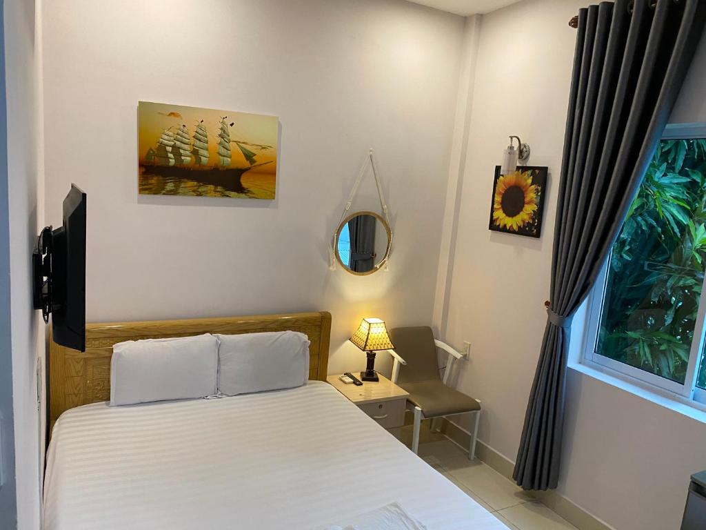 Postel nebo postele na pokoji v ubytování Bonjour Hostel