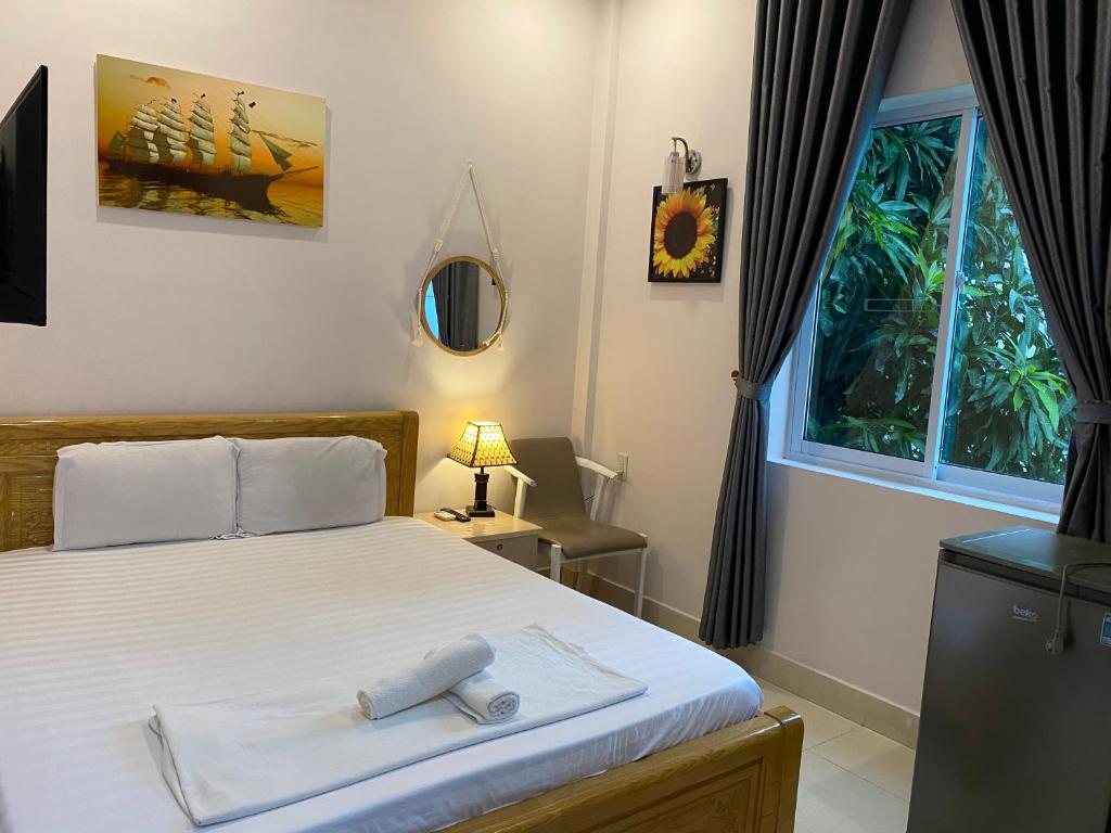 Postel nebo postele na pokoji v ubytování Bonjour Hostel
