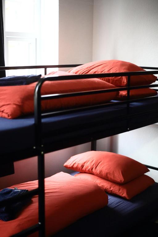 Postel nebo postele na pokoji v ubytování Central Backpackers