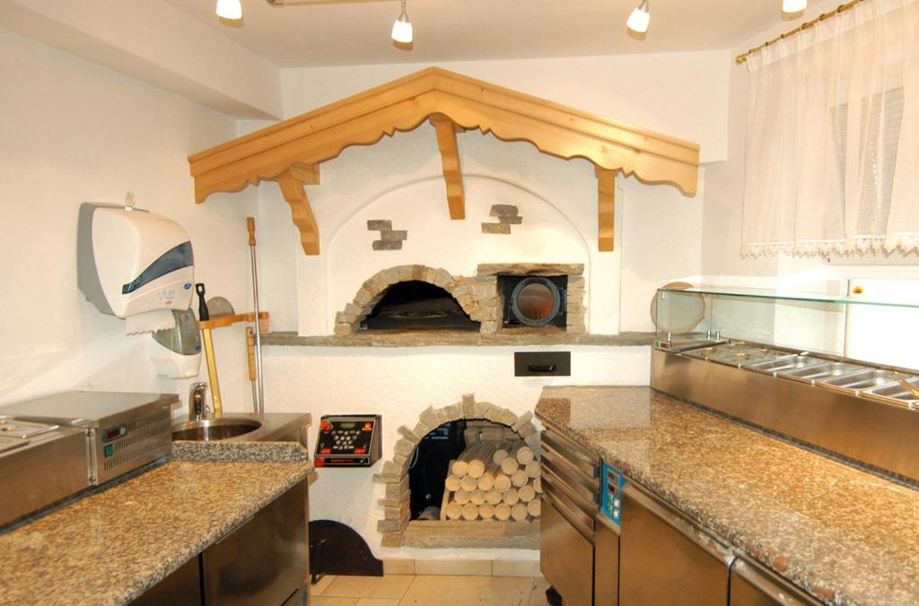 Kuchyň nebo kuchyňský kout v ubytování Residence Priska