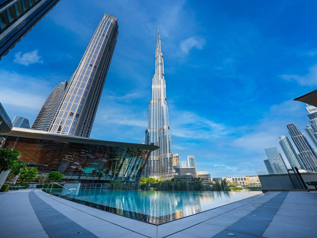 a view of the chicago city skyline from the river at SmartStay at Grande Signature - Downtown Dubai City Views - Brand New Luxury Apartments in Dubai