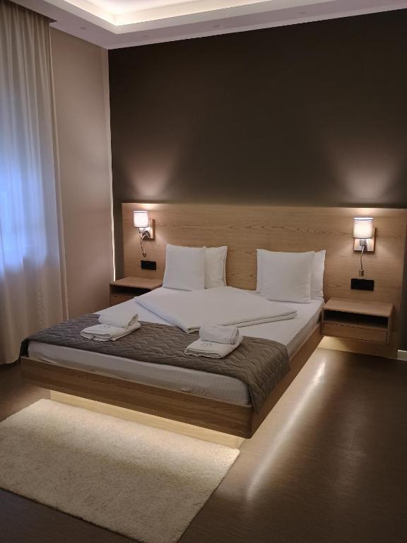 Postel nebo postele na pokoji v ubytování Emilia Lux Rooms