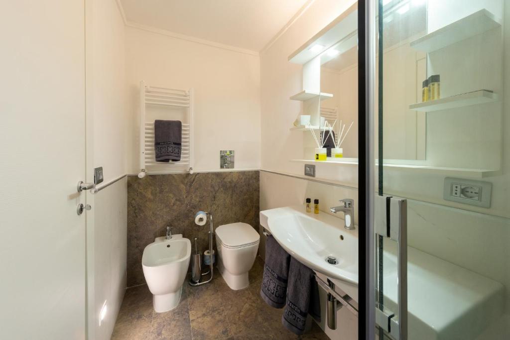 Koupelna v ubytování Il Tesoro Smart Suite & SPA