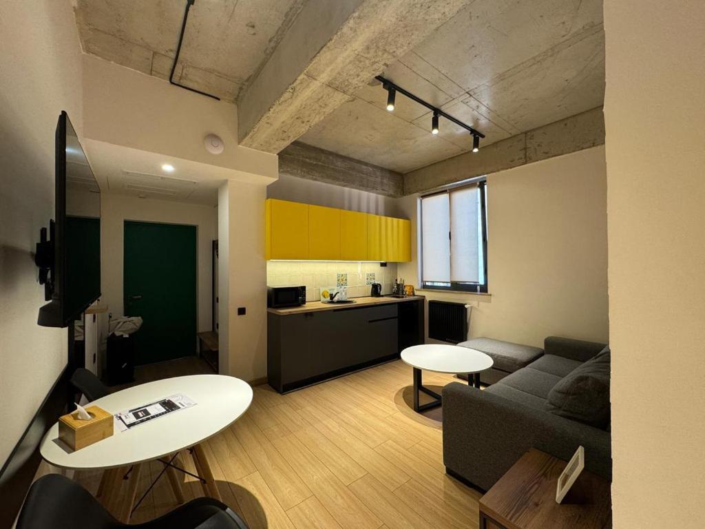 Kuchyň nebo kuchyňský kout v ubytování Rooms Apart-Hotel by RED