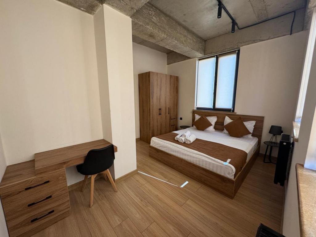 Postel nebo postele na pokoji v ubytování Rooms Apart-Hotel by RED