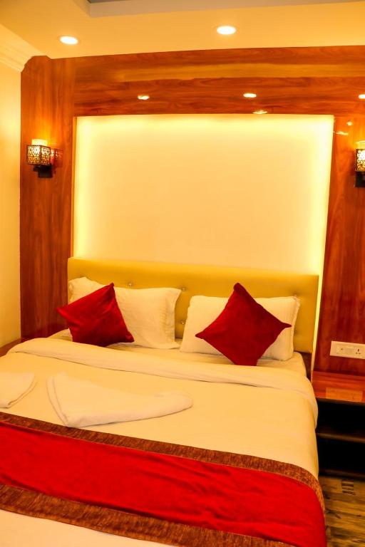 Postel nebo postele na pokoji v ubytování Thani Boutique Hotel