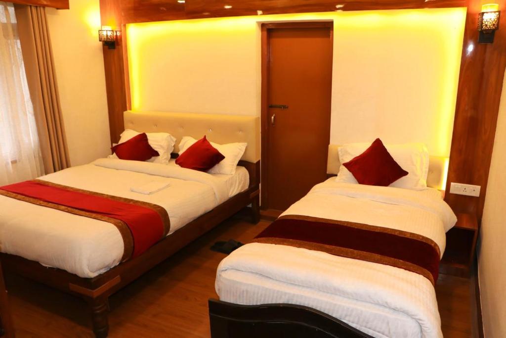 Postel nebo postele na pokoji v ubytování Thani Boutique Hotel