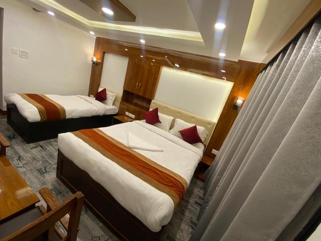 Postel nebo postele na pokoji v ubytování Thani Boutique Hotel