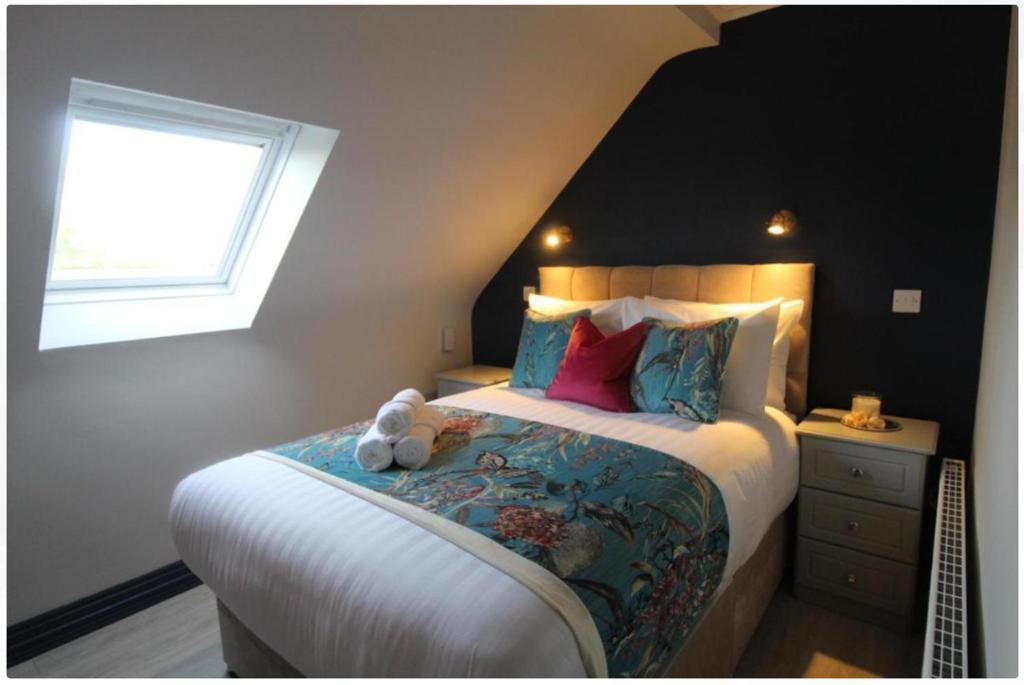 Postel nebo postele na pokoji v ubytování Dutch Tulip Rooms