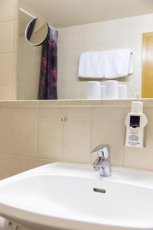 Koupelna v ubytování AKZENT Hotel Meerfräulein