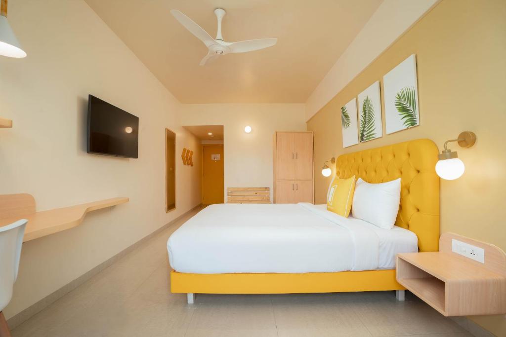 Postel nebo postele na pokoji v ubytování Bloom Hotel - Lonavala Khandala