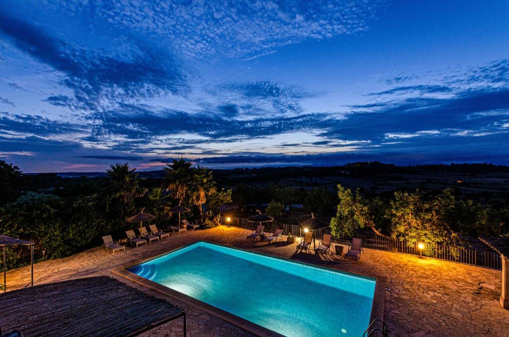 The swimming pool at or close to Finca es Rafal, Agroturisme