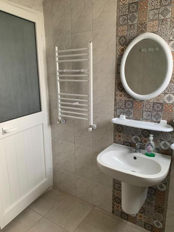 Koupelna v ubytování Appartements de luxe près de la mer