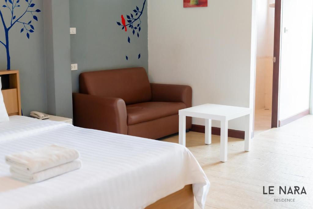 Postel nebo postele na pokoji v ubytování Le Nara Residence