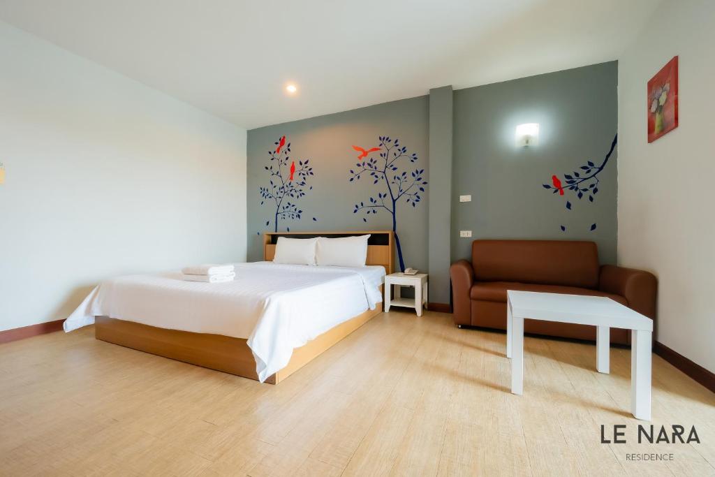 Postel nebo postele na pokoji v ubytování Le Nara Residence