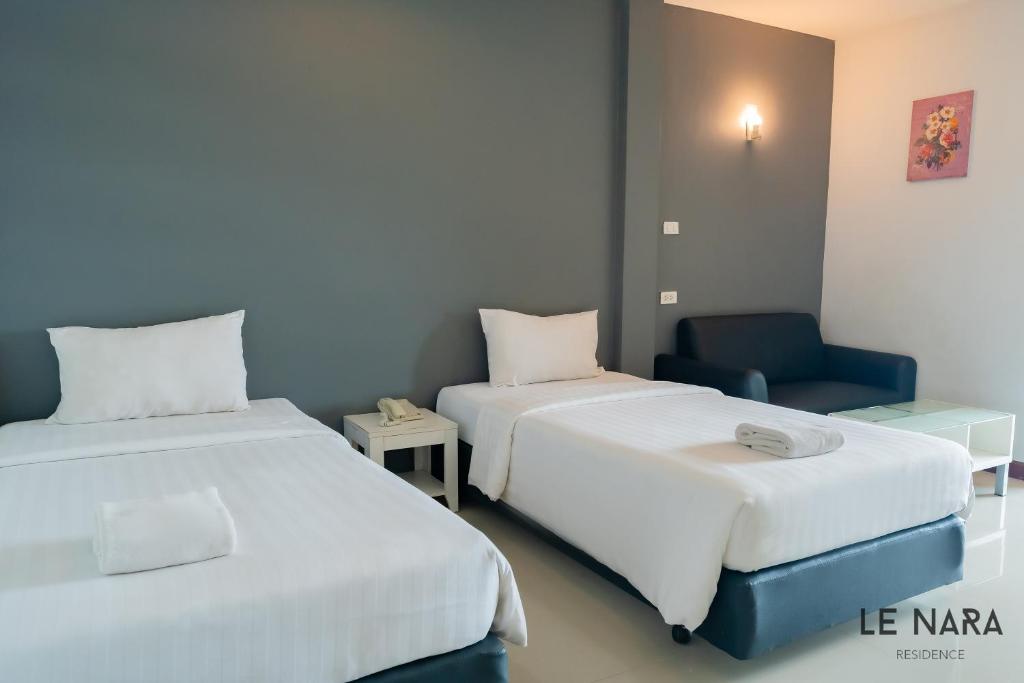 Postel nebo postele na pokoji v ubytování Le Nara Residence