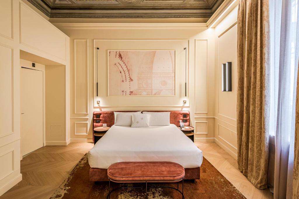 Postel nebo postele na pokoji v ubytování Palazzo Montebello