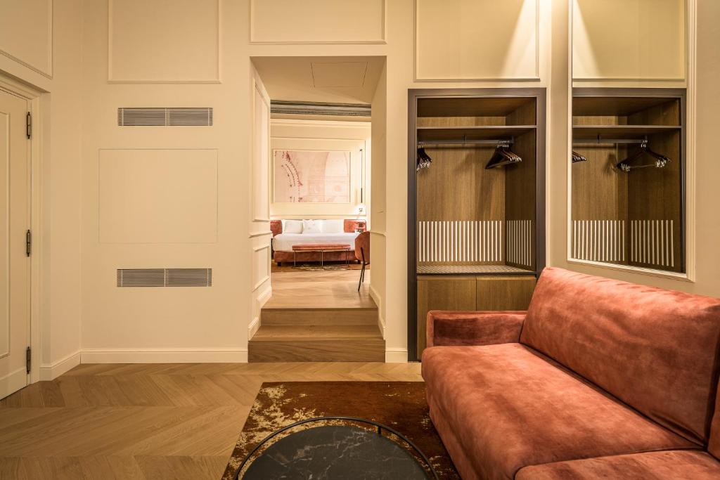 Postel nebo postele na pokoji v ubytování Palazzo Montebello