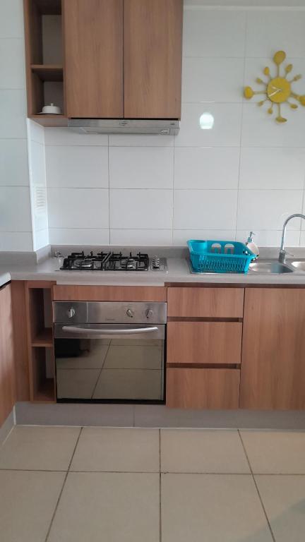 Kuchyň nebo kuchyňský kout v ubytování Esmeralda Apartment