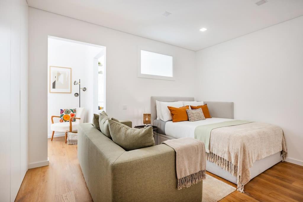 Postel nebo postele na pokoji v ubytování Matosinhos Seaside Prime Studio