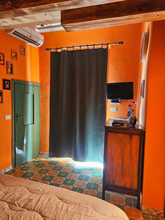 TV a/nebo společenská místnost v ubytování L' Antico lavatoio