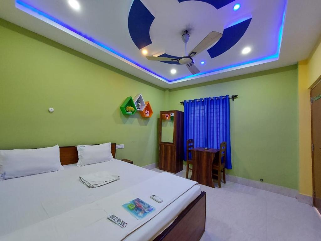 Postel nebo postele na pokoji v ubytování Samriddha Beach Resort