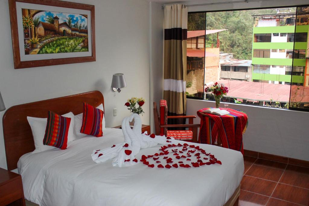 Postel nebo postele na pokoji v ubytování Hotel Wiracocha Machupicchu