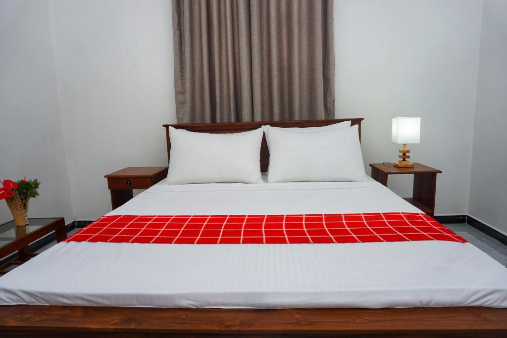Postel nebo postele na pokoji v ubytování Lavender Resort