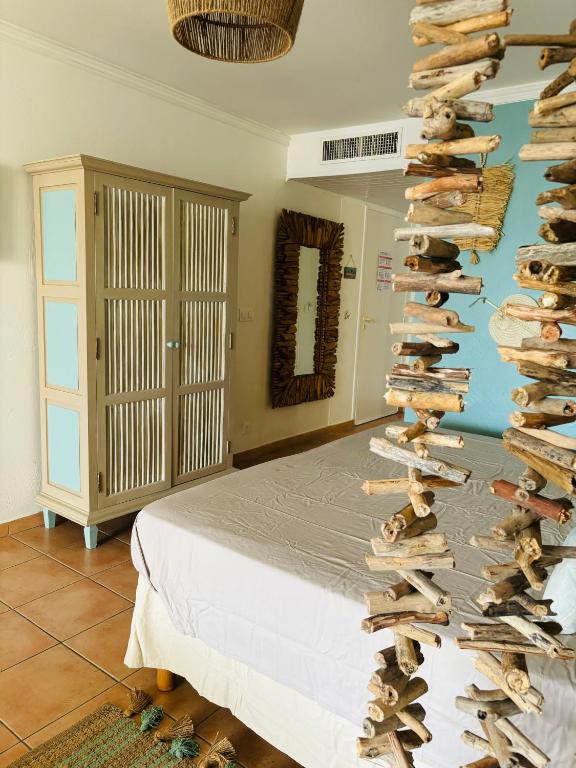 Postel nebo postele na pokoji v ubytování Appartement Bleu de Sable VUE MER résidence de vacances